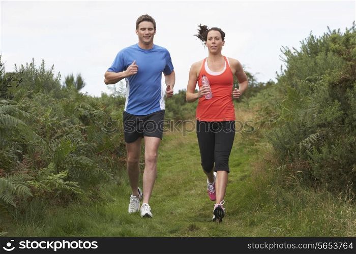 Couple On Run In Countryside