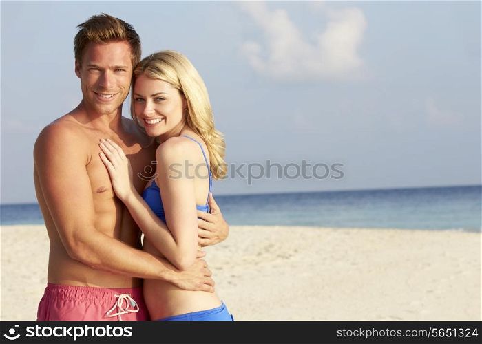 Couple On Tropical Beach Holiday