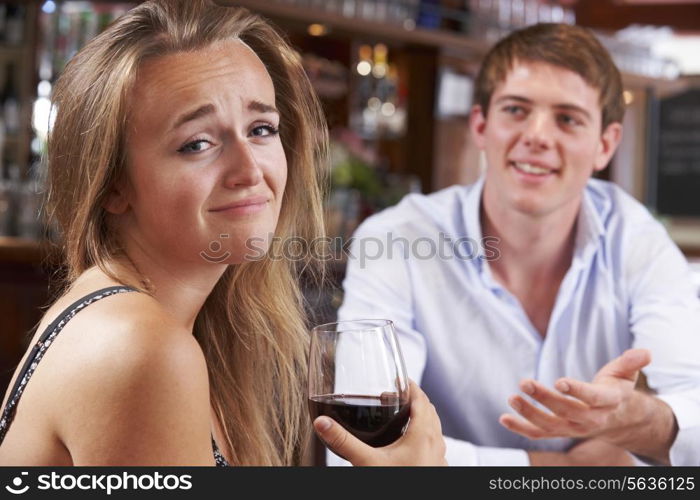 Couple On Unsuccessful Blind Date In Restaurant