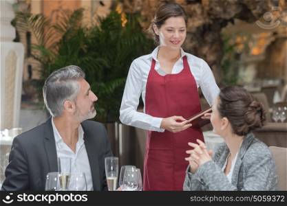 couple ordering dinner in a luxury restaurant