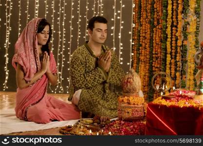 Couple performing a pooja