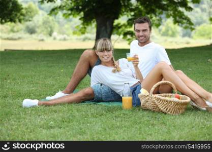 Couple picnicking in the countryside