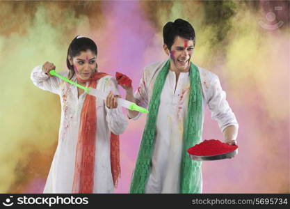 Couple playing holi