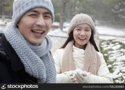 Couple Playing in the Snow