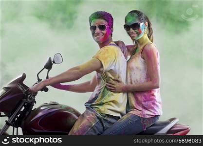 Couple posing on a motorcycle