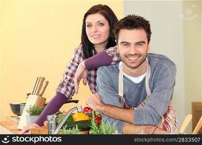 Couple preparing a meal together