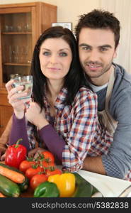 Couple preparing a meal together