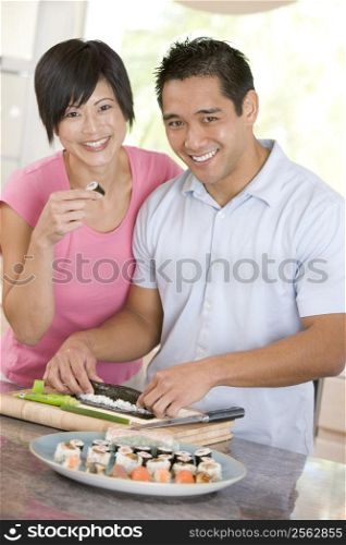 Couple Preparing Sushi Together