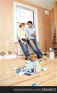 Couple Preparing to Paint Room Together