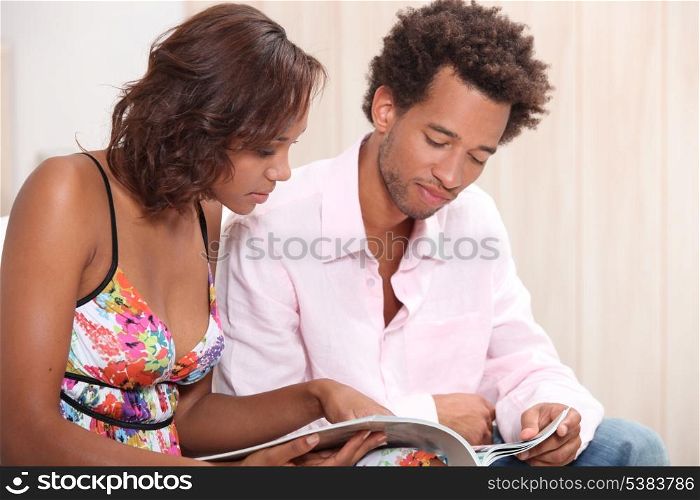 Couple reading a brochure