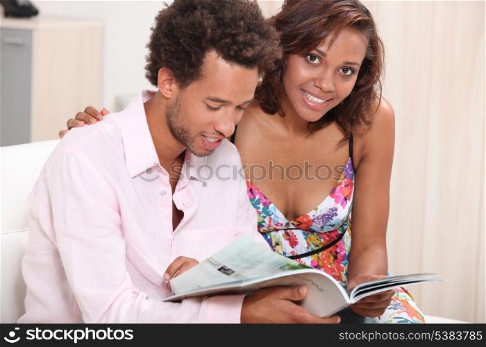 Couple reading on a sofa