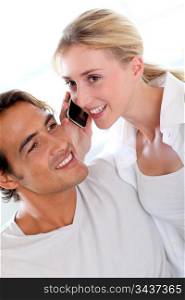Couple receiving a phonecall