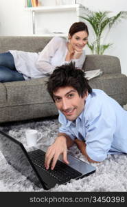 Couple relaxing at home