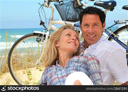 Couple relaxing by the seaside