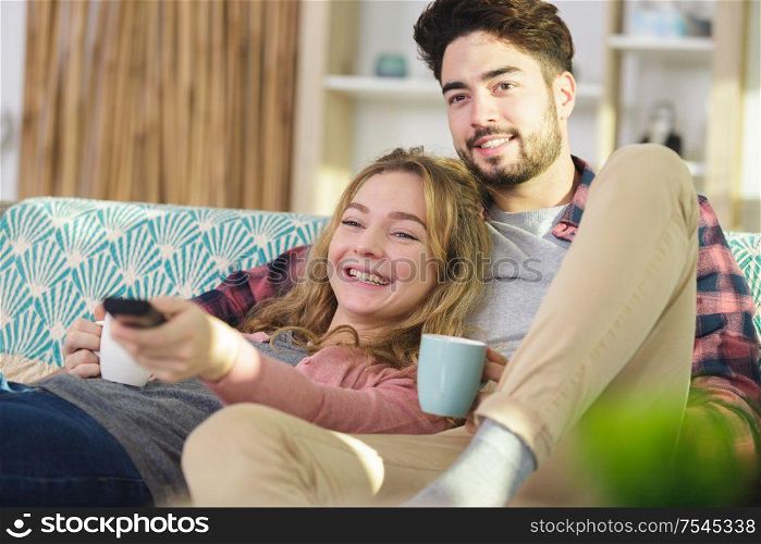 couple relaxing during home renovation having a coffee break