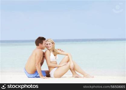 Couple Relaxing On Beautiful Beach Together