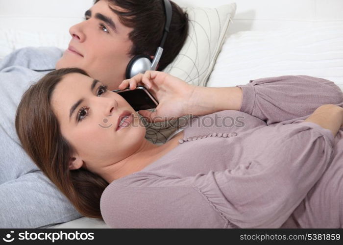 Couple relaxing on sofa