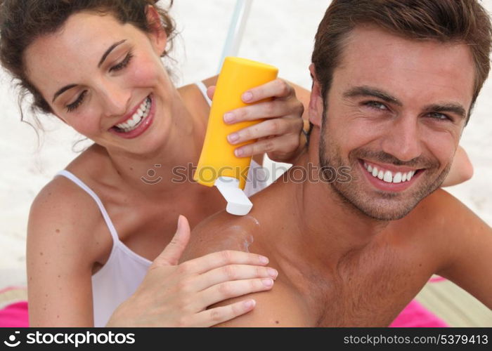 couple relaxing on the beach