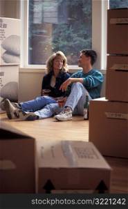 Couple Relaxing While Moving