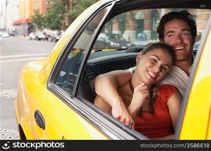 Couple Riding in Taxi Cab