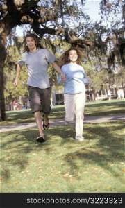 Couple Running in Park