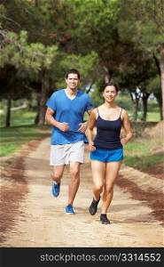 Couple running in park