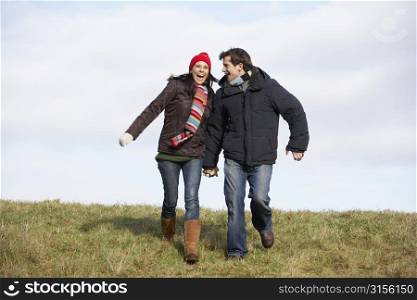Couple Running In The Park