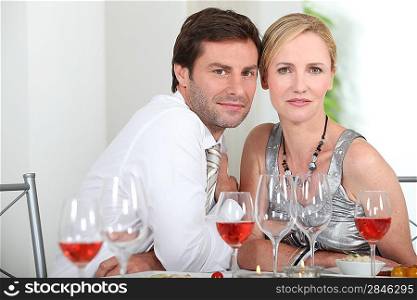 Couple sat at table