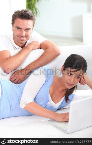 Couple sat in living-room