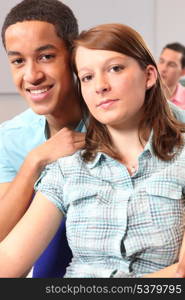 Couple sat in university lecture