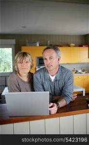 Couple searching for recipes on the Internet