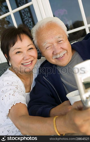 Couple Sharing Cell Phone