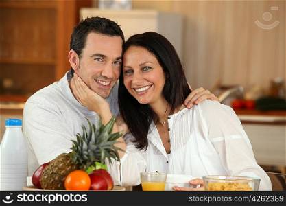 couple shining with happiness at breakfast
