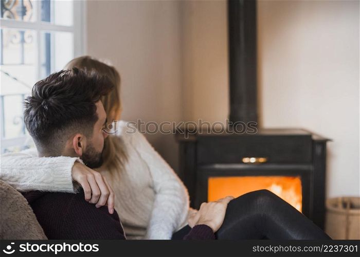 couple sitting embrace