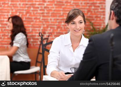 Couple sitting in a restaurant