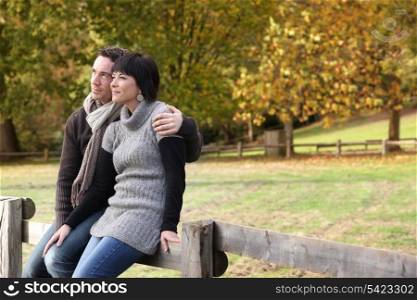 Couple sitting in the countryside