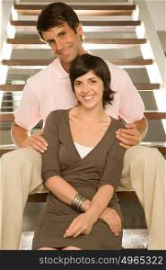 Couple sitting on stairs