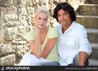 Couple sitting on steps