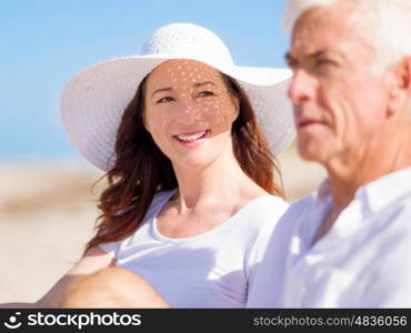 Couple sitting on the beach. Just us and the ocean