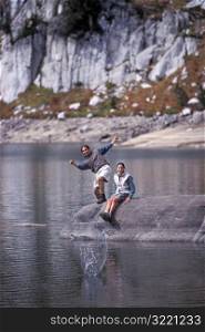 Couple Skipping Rocks Together