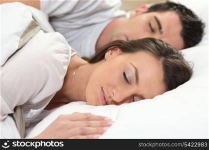 couple sleeping together