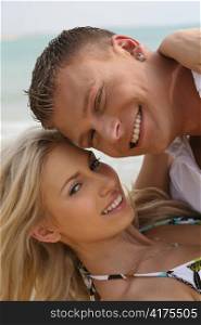 Couple smiling on the beach