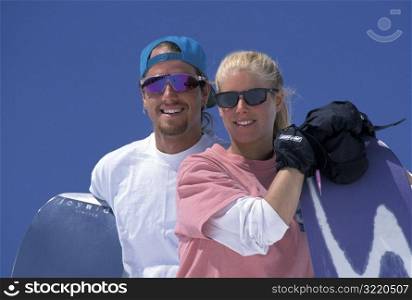 Couple Snowboarding Together