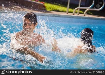 Couple splashing