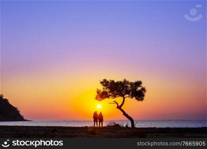 Couple standing on a Turkey sea coast