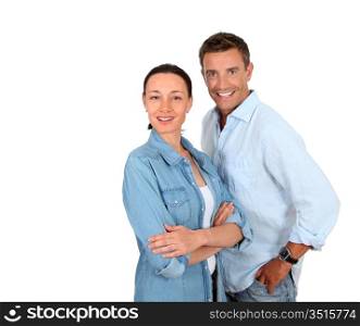 Couple standing on white background