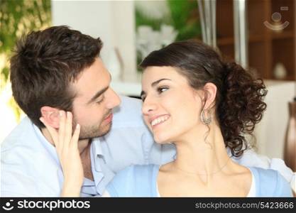Couple staring lovingly into each other&rsquo;s eyes