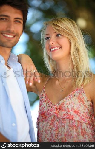 Couple stood in park