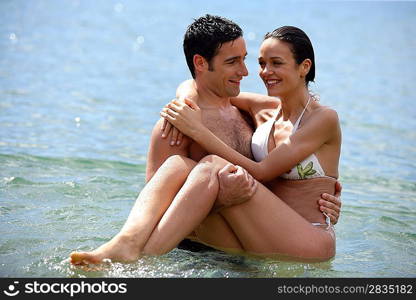 Couple stood in the sea