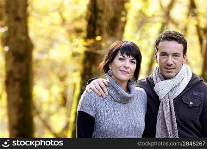 Couple strolling in the park together